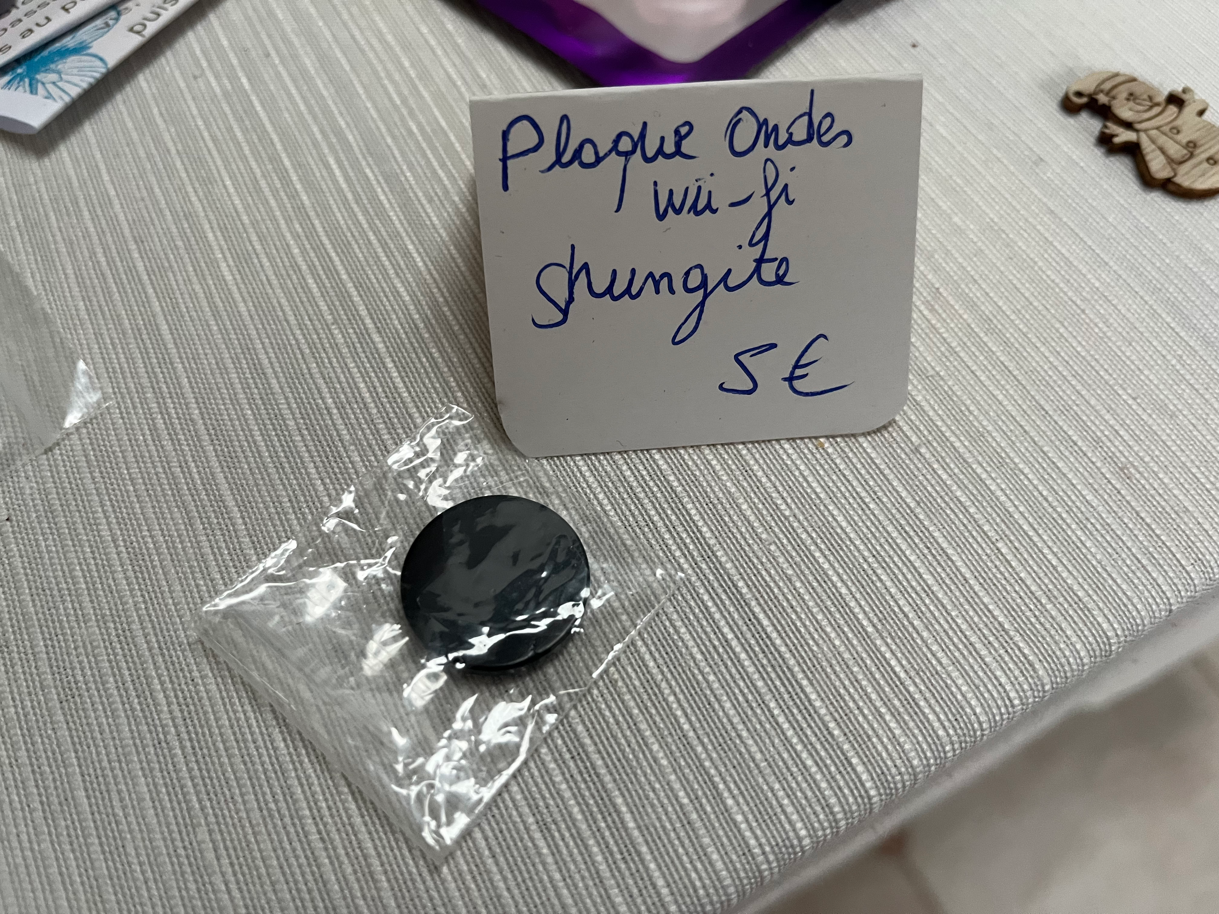Plaquette de téléphone shungite ronde 