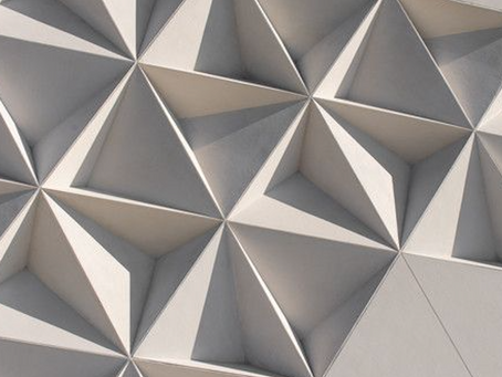 Geometric precision reflecting the principle of separation of concerns in software architecture, illustrated through a pattern of interlocking triangles.