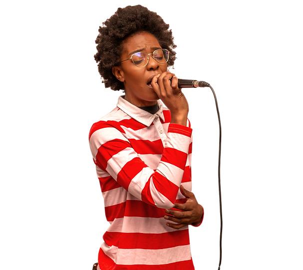 Young woman singing into a microphone ou