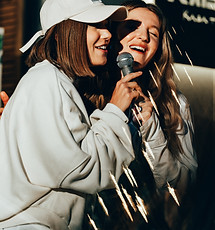 a couple of women standing next to each other_edited.jpg