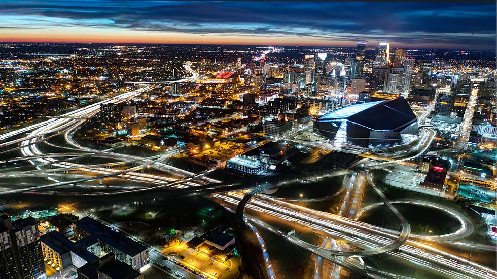 Aerial photo of downtown Minneapolis at night with beautiful bright lights