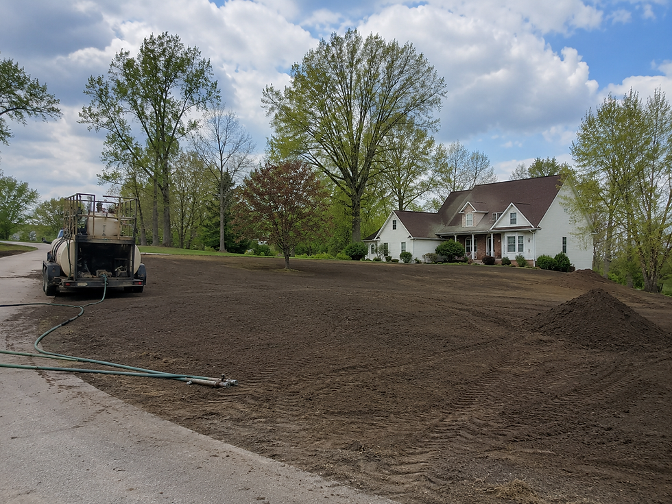 How far in advance should you schedule hydroseeding in Decorah IA, showing a prepared residential lawn ready for professional hydroseed installation.