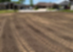 Finish-graded residential yard prepared for sod or hydroseeding