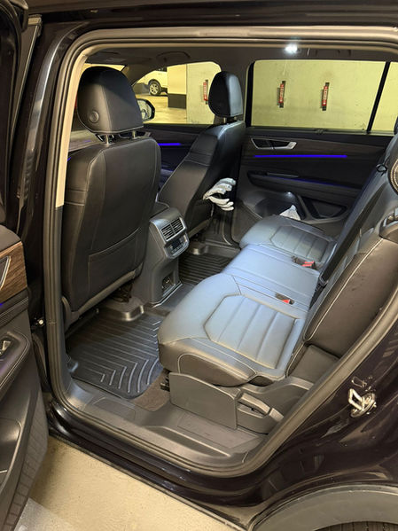 Fully cleaned rear seats and floor of Volkswagen Atlas after interior detailing with fresh, restored appearance.