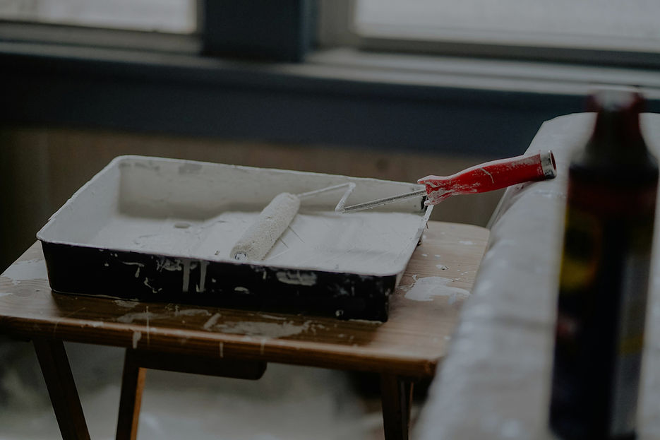 Paint tray and roller representing professional interior and exterior painting services in Toronto and the Greater Toronto Area.