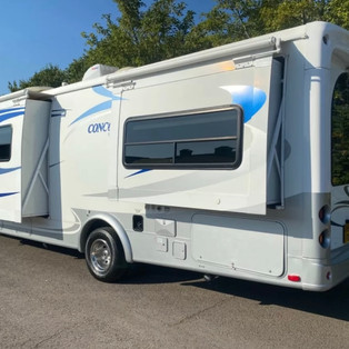 Winnebago hire with Twin Slide outs Wagon Wheels On Location 