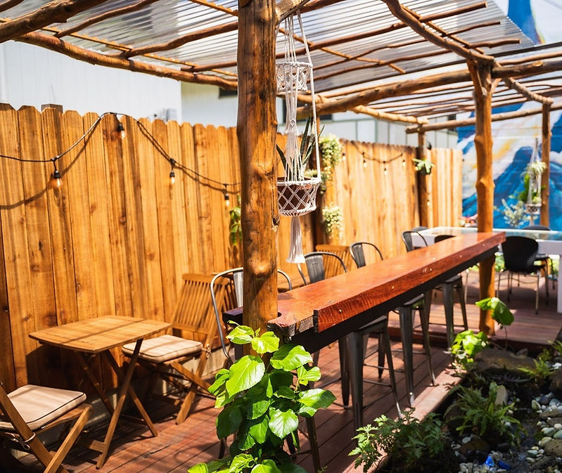 Working and event space in Treehouse Coworking Kailua's Backyard