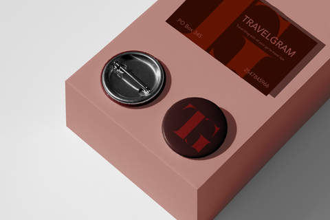 Pin and Button of a travel agency and blog with shades of red coloring 