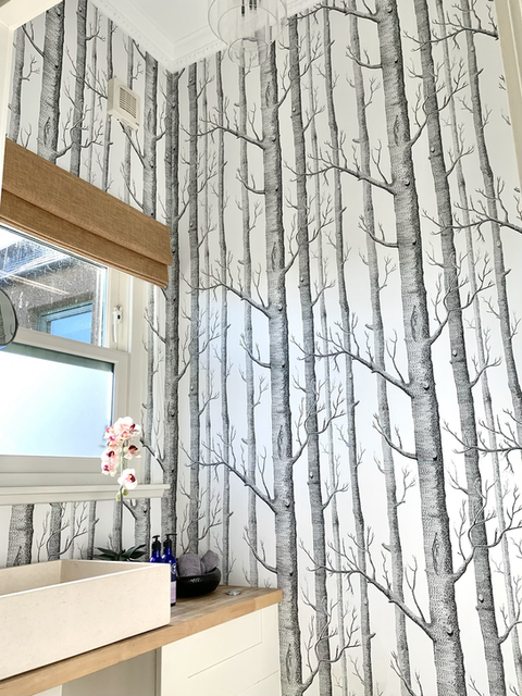 Woods wallpaper by Cole and Sons and the Porcelanosa marble sink at Mid Coullie near Drumtochty Castle and Fasque Estate in Aberdeenshire
