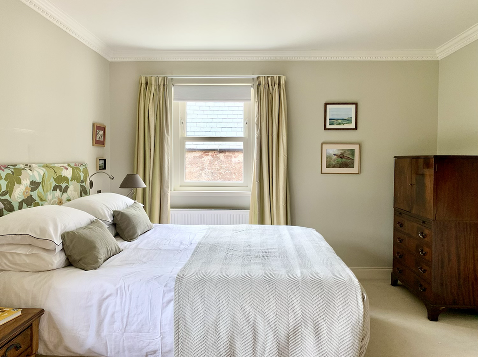 The King bedroom with views of the garden at Mid Coullie Cottage near Drumtochty Castle and Fasque Estate 