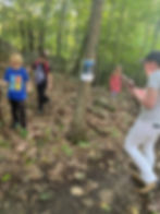 gathered in front of a book hike page