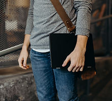 Man Holding Laptop