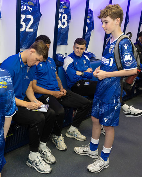 Noah Meeting the players and getting their autographs.