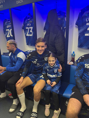 Sam Gale with Mascot Draw Winner Phoebe Cork