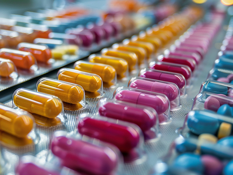 multiple colored medicine capsules in foil packaging