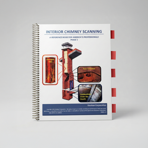 A chimney inspection camera in a wooden frame with a brick wall.