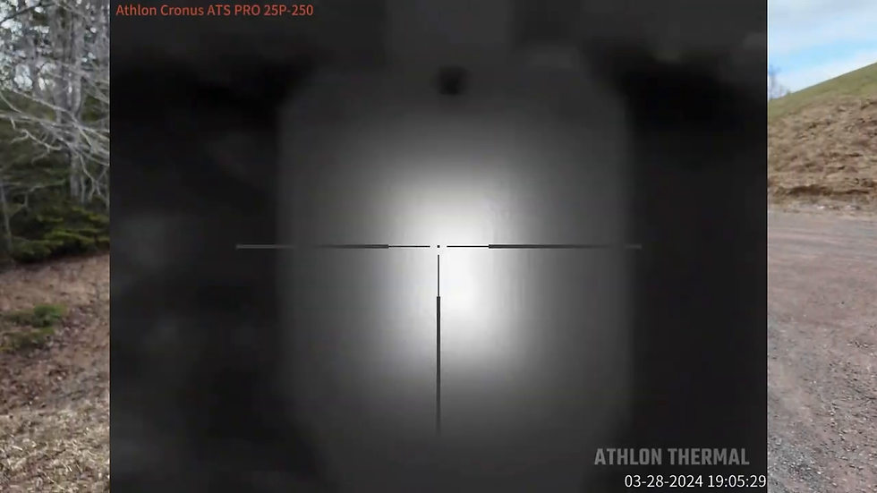 Thermal scope view comparing a person's heat signature to a heated steel target while zeroing a thermal scope