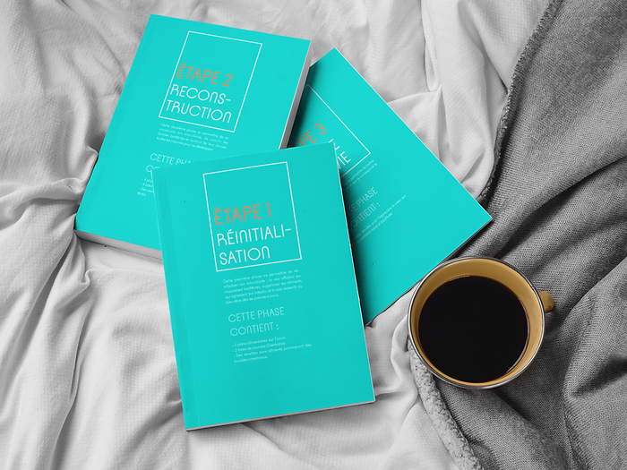 three-messy-books-mockup-on-a-bed-near-a