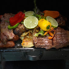 Meat Lover Parrillada and 2 sides 79.99