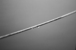 minimalistic photo showing a water drop in the middle 