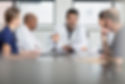 team-of-doctors-discussing-in-a-meeting-room-2024-06-26-23-52-52-utc.jpg