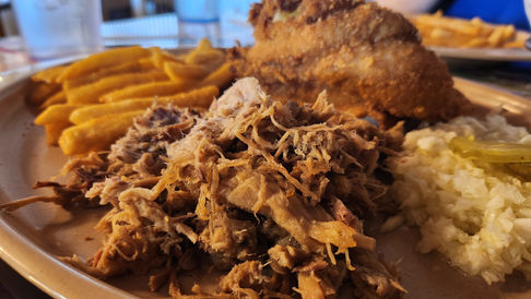 Greenbrier's pulled pork and fried catfish fillet plate with slaw & fries