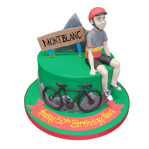 Bespoke Mount Blanc Cyclist cake with detailed cyclist figure and mountain design, crafted in Solihull, West Midlands.