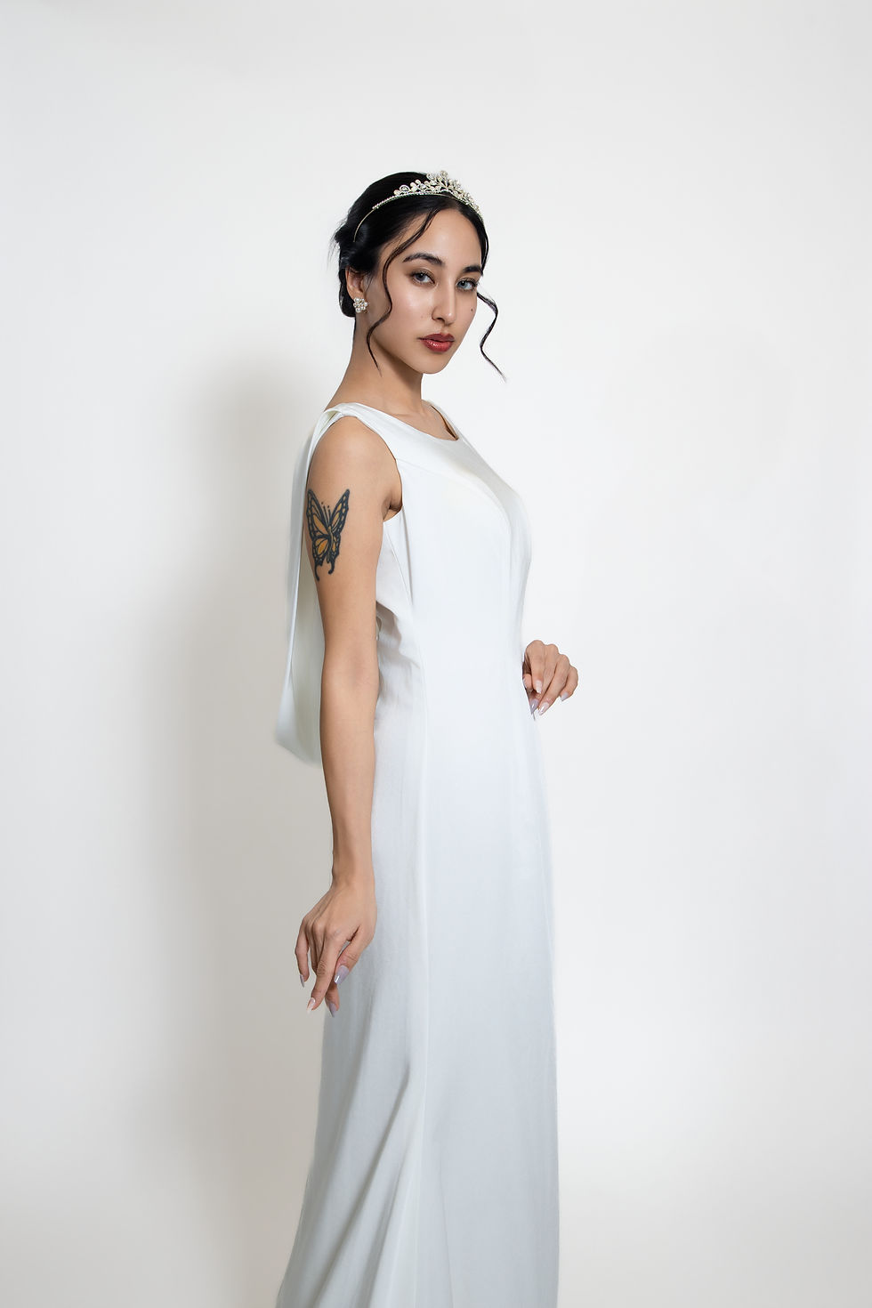 Thumbnail: sleeveless wedding dress side portrait clean aesthetic