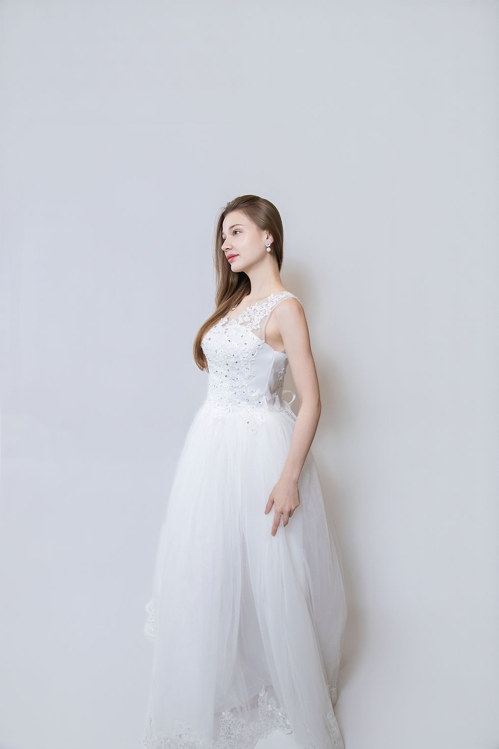 Thumbnail: illusion neckline wedding dress full body side silhouette