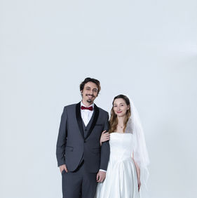 studio wedding photoshoot couple standing clean white