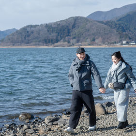 mount fuji engagement couple walking candid