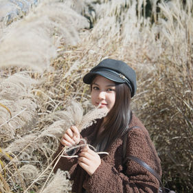 mount fuji engagement portrait woman autumn grass