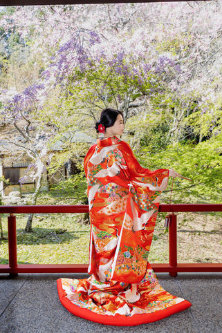iro uchikake kimono bride portrait on red bridge