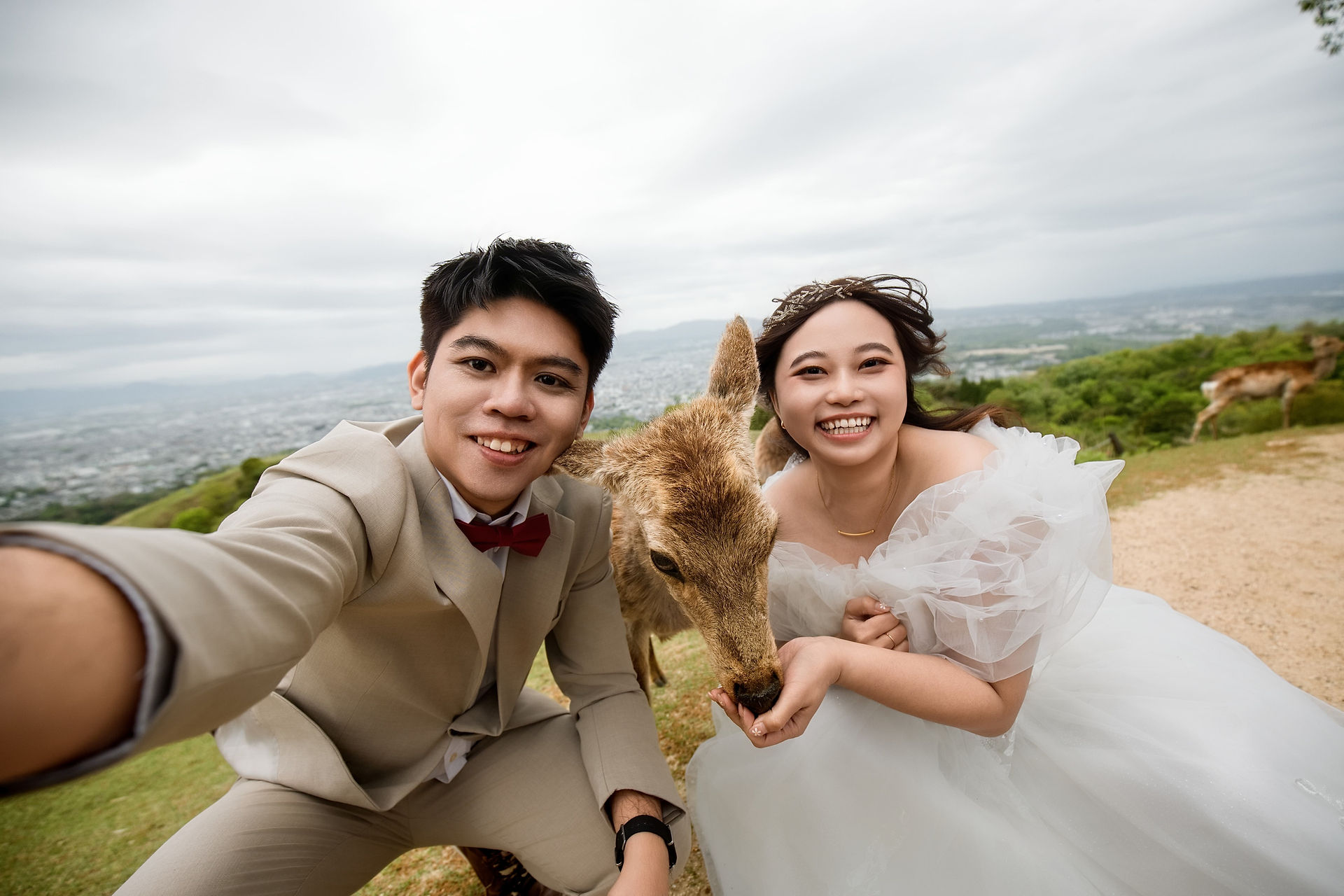 joyful selfie portrait with deer in nara park