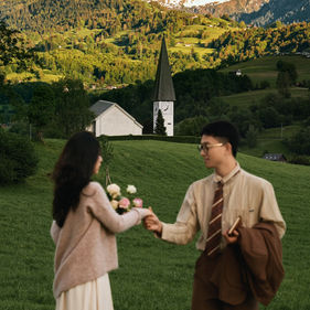 switzerland prewedding couple alpine village church background