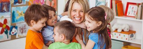kidsteacherhugging.jpg