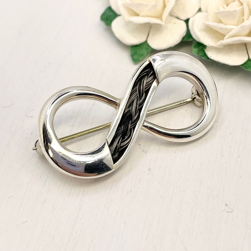 Thumbnail: Infinity Brooch with braid
