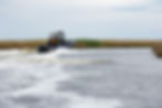People ride in a boat