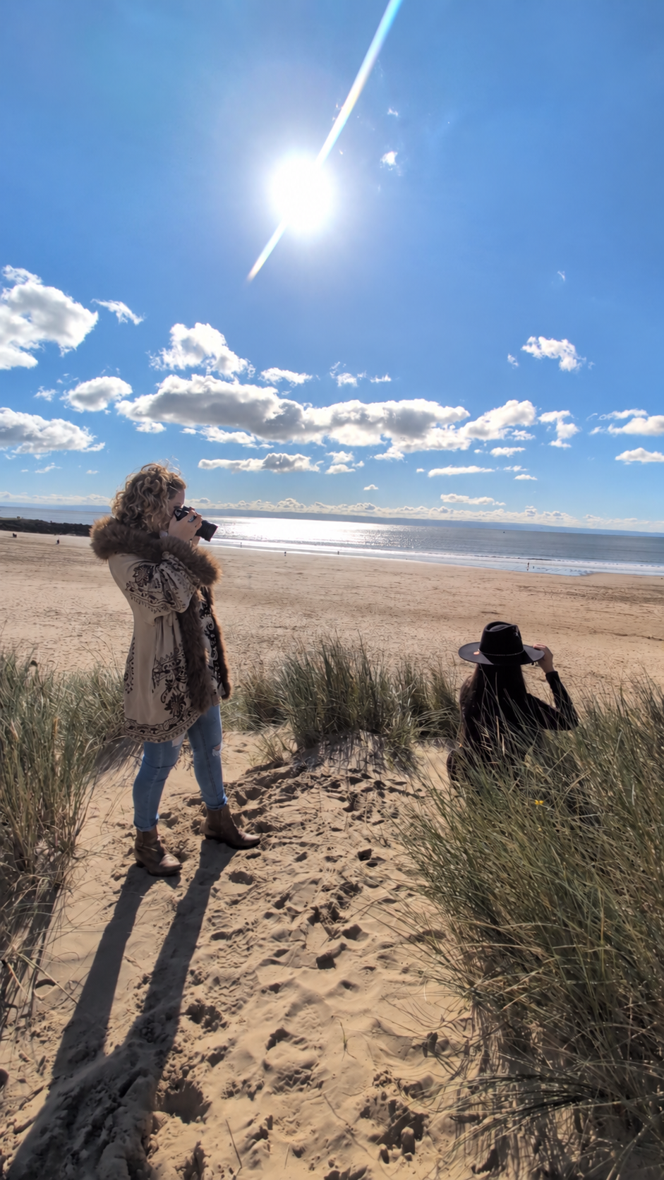 Behind the scenes at the Welsh coast: Ceri photographing a Prairie Jane hat photoshoot