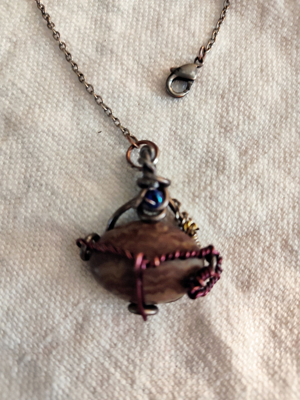 Red Jasper Pendant hand wrapped on a chain with lobster claw clasp, in the fornt of neck or easy on\off.