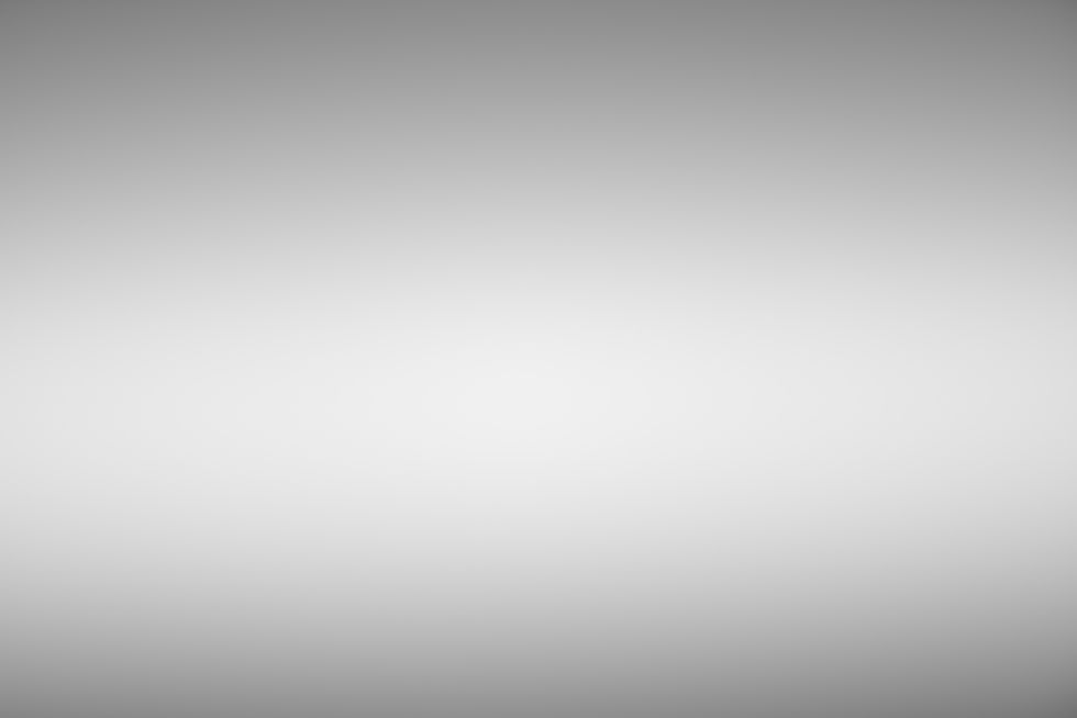 Grey gradient blurred abstract studio background.jpg