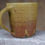 Thumbnail: Coffee Cup - red ochre ash glaze