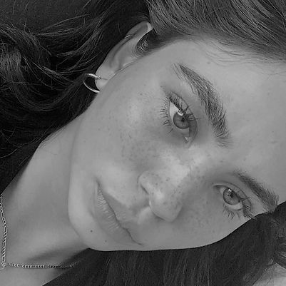 A girl staring in the camera