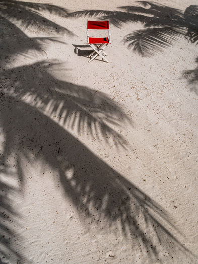 red director chair photography travel take your seat