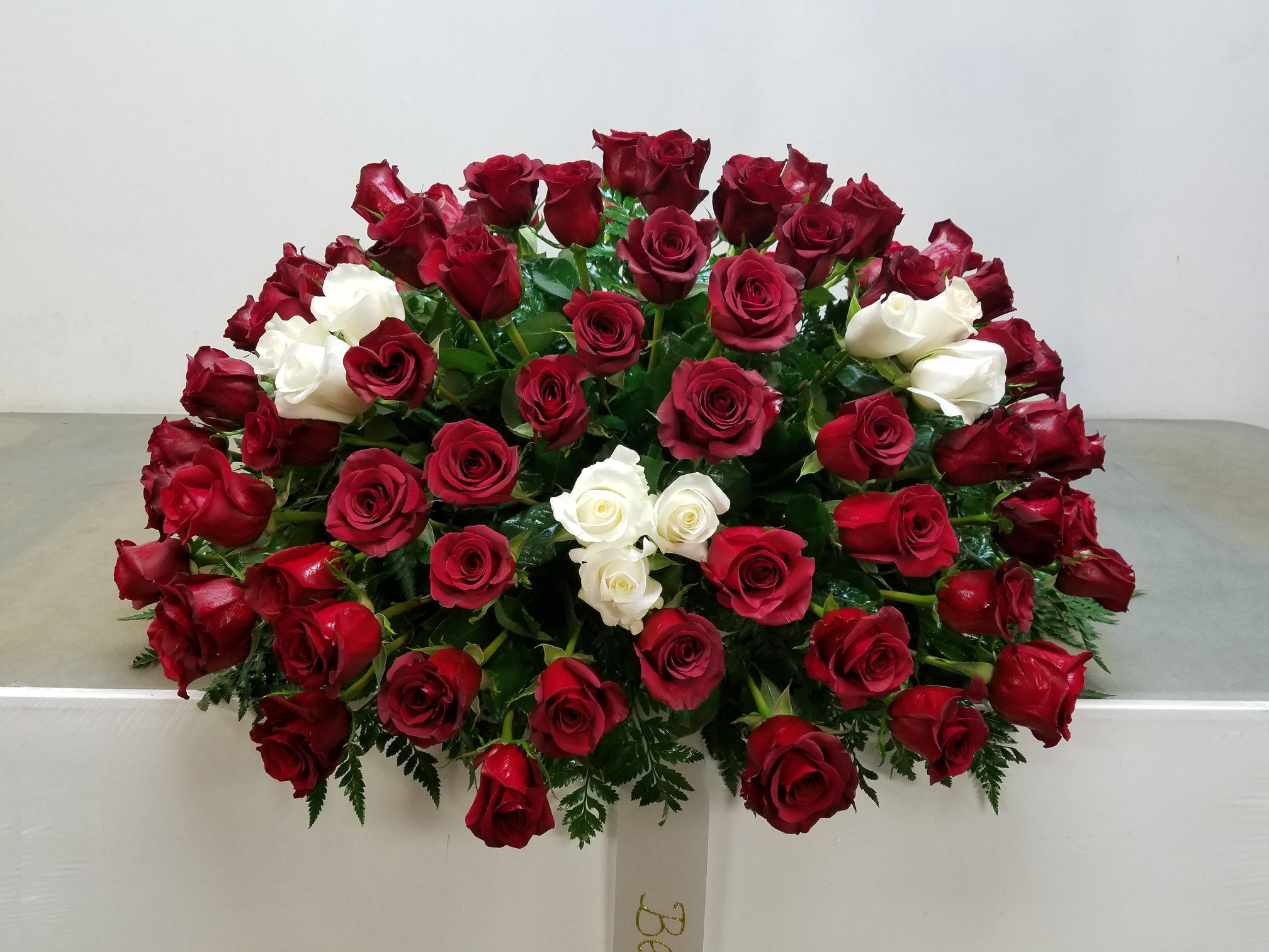 70 Roses Casket Spray