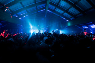 High-energy concert venue transformed by professional moving light rental and stage lighting design. Event production Salt Lake City delivers concert-quality experiences with pro audio gear rental and expert technical direction.