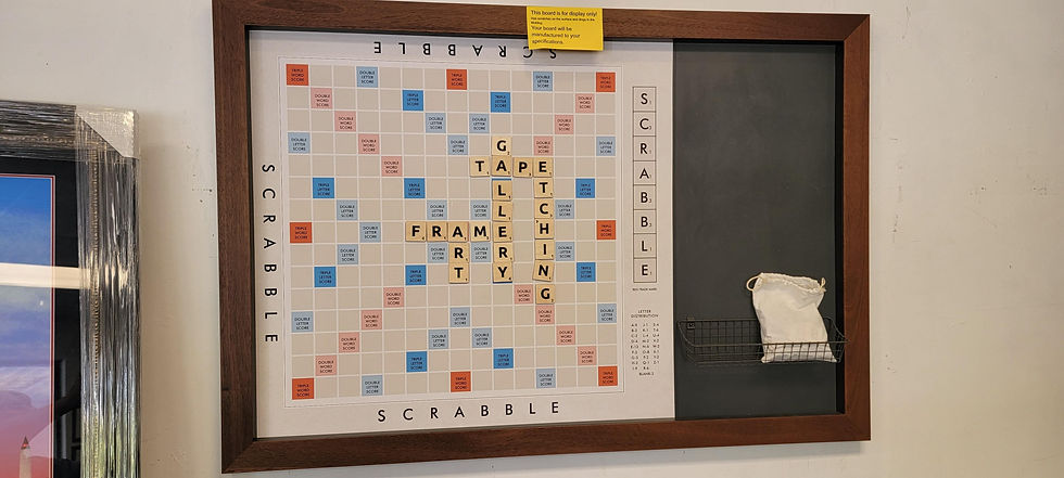 Custom framed Scrabble wall game mounted as functional wall art with storage and scoring area.