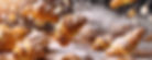 fresh-bakery-items-such-as-croissants-muffins-pastries-flying-midair-with-dusting.jpg