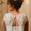Miniature : Top de mariée en dentelle de Calais, avec manches bouffantes disponibles en version longues ou courtes, et dos nu élégant.