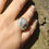 Thumbnail: PERUVIAN OPAL & SILVER BEZEL SET RING. SIZE N